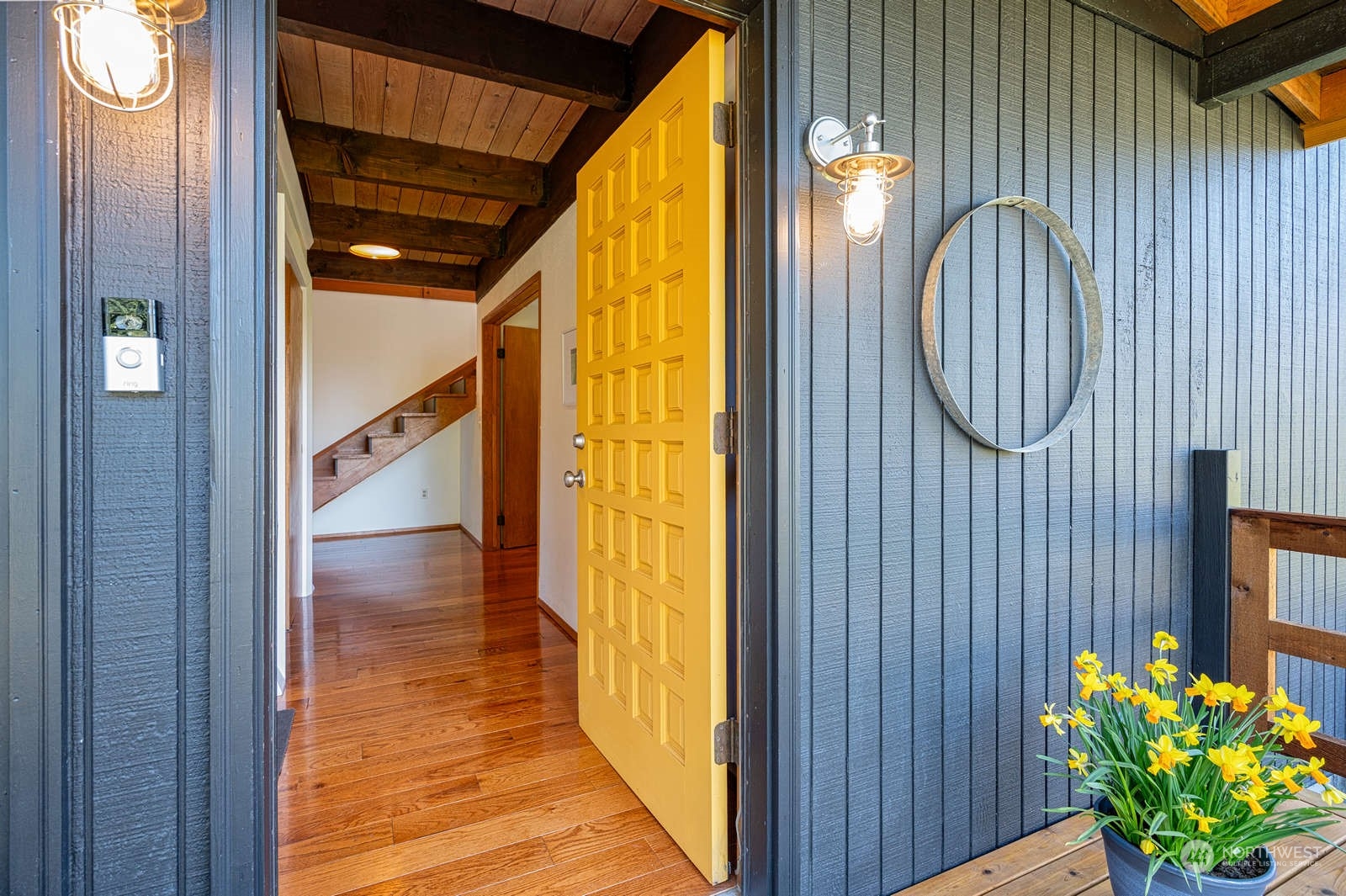 11907 103rd Avenue Southwest Vashon, WA 98070 - Photo 3 of 40 a front view of a house with wooden floor