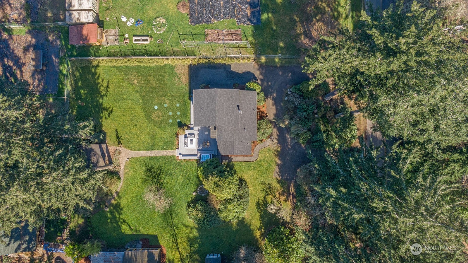 11907 103rd Avenue Southwest Vashon, WA 98070 - Photo 40 of 40 an aerial view of a house with a yard and lake view
