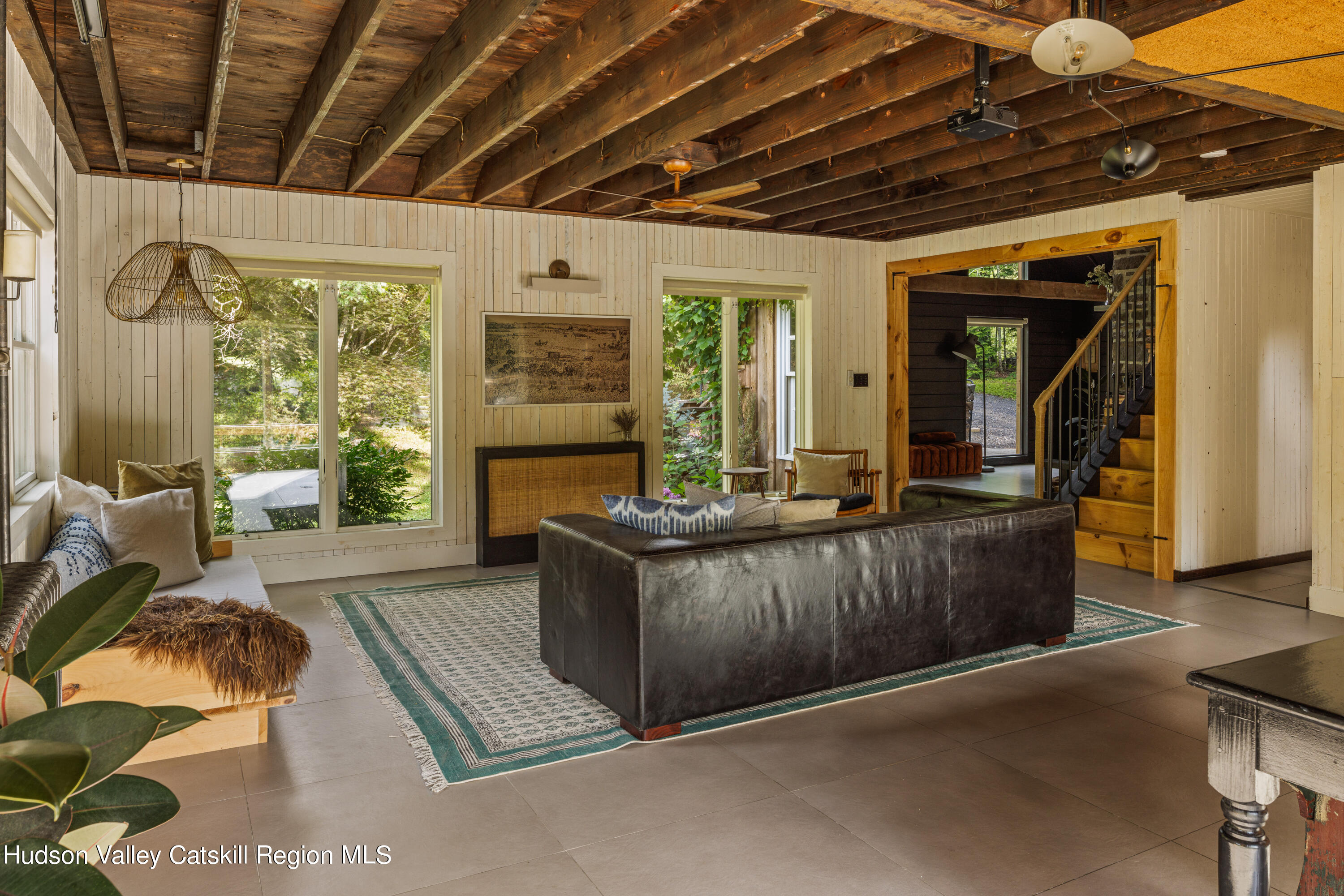 193 Cantine Road Kingston, NY 12401 - Photo 11 of 36 a living room with furniture and a large window