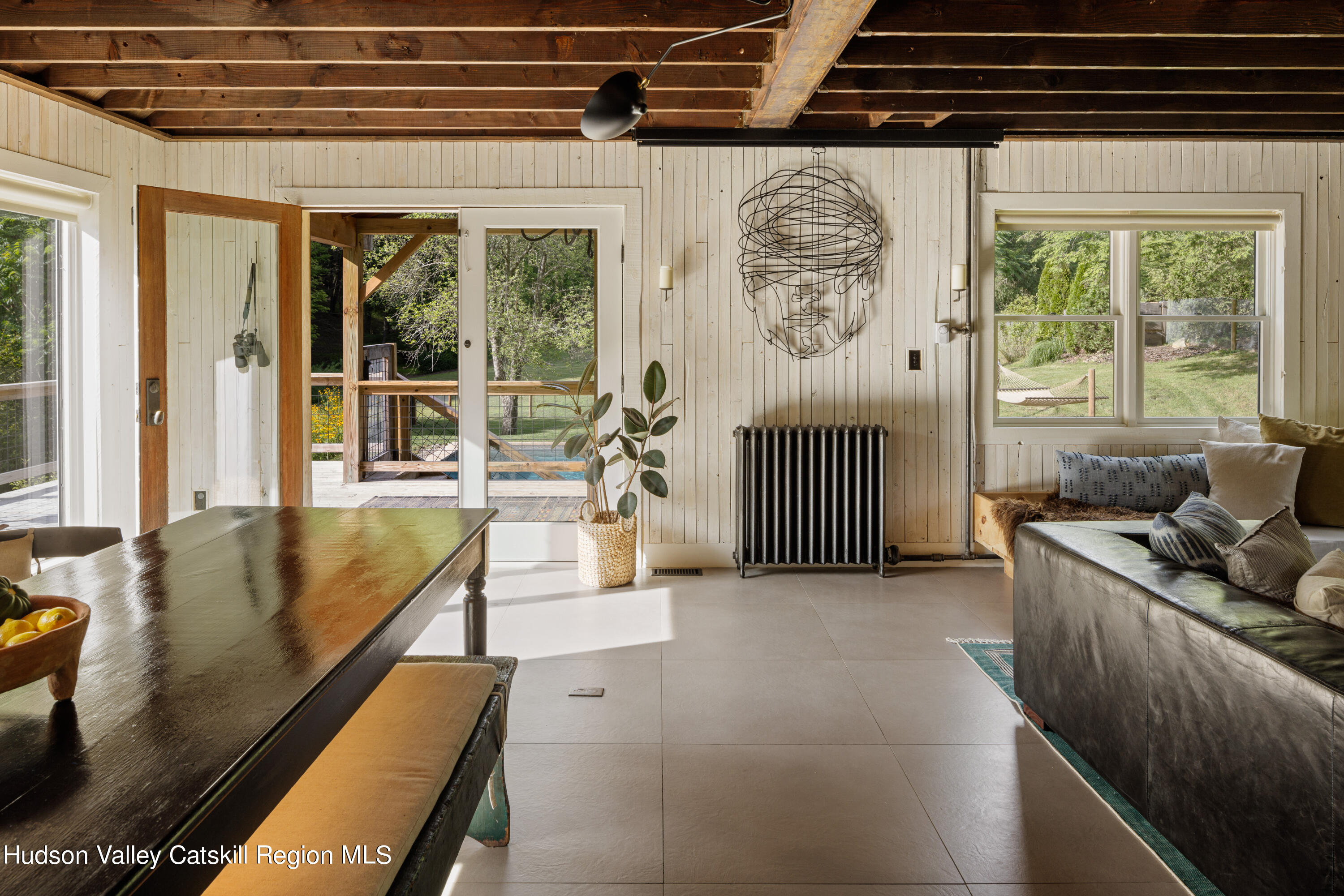 193 Cantine Road Kingston, NY 12401 - Photo 12 of 36 a living room with furniture and a flat screen tv