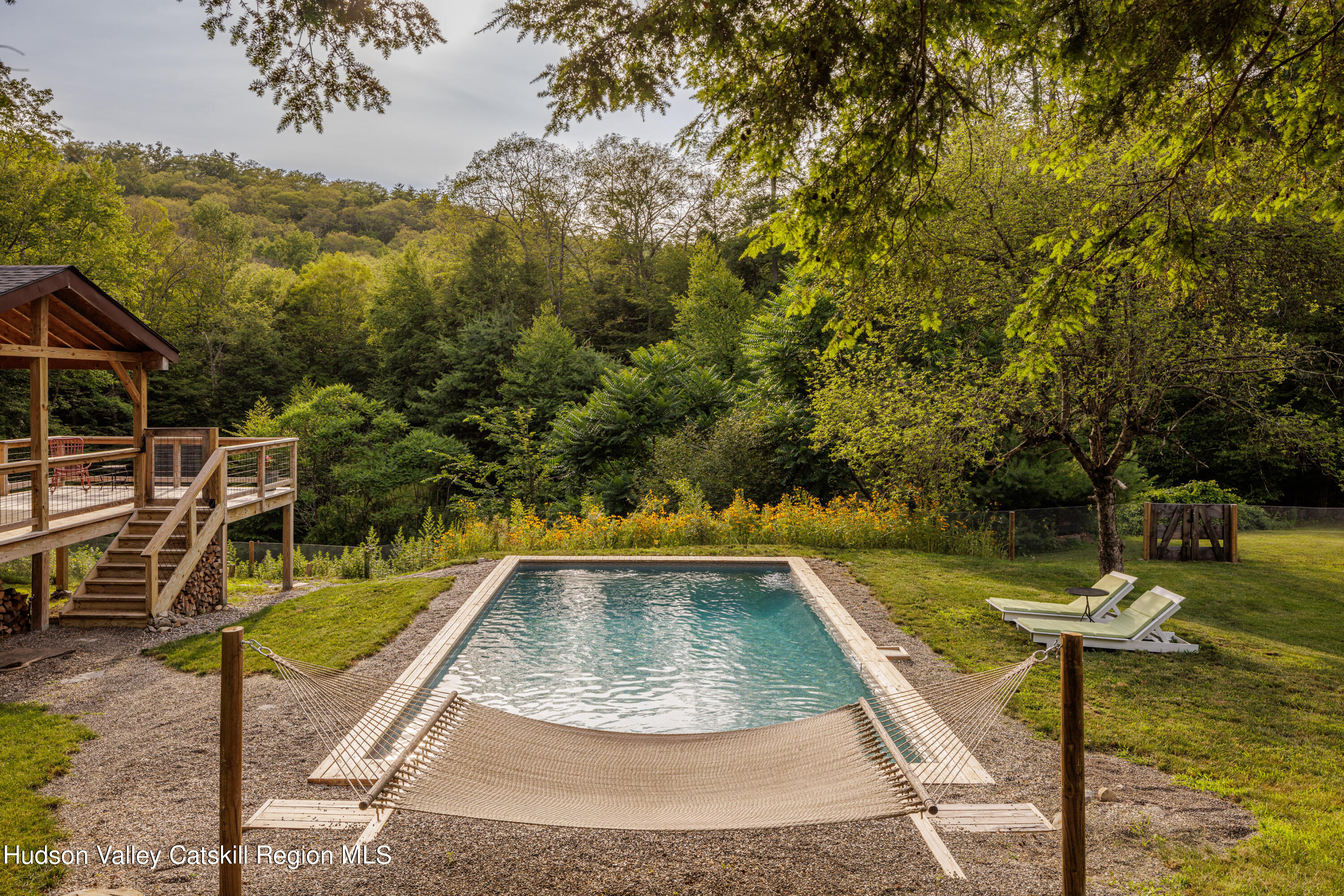 193 Cantine Road Kingston, NY 12401 - Photo 27 of 36 a view of a swimming pool with a patio