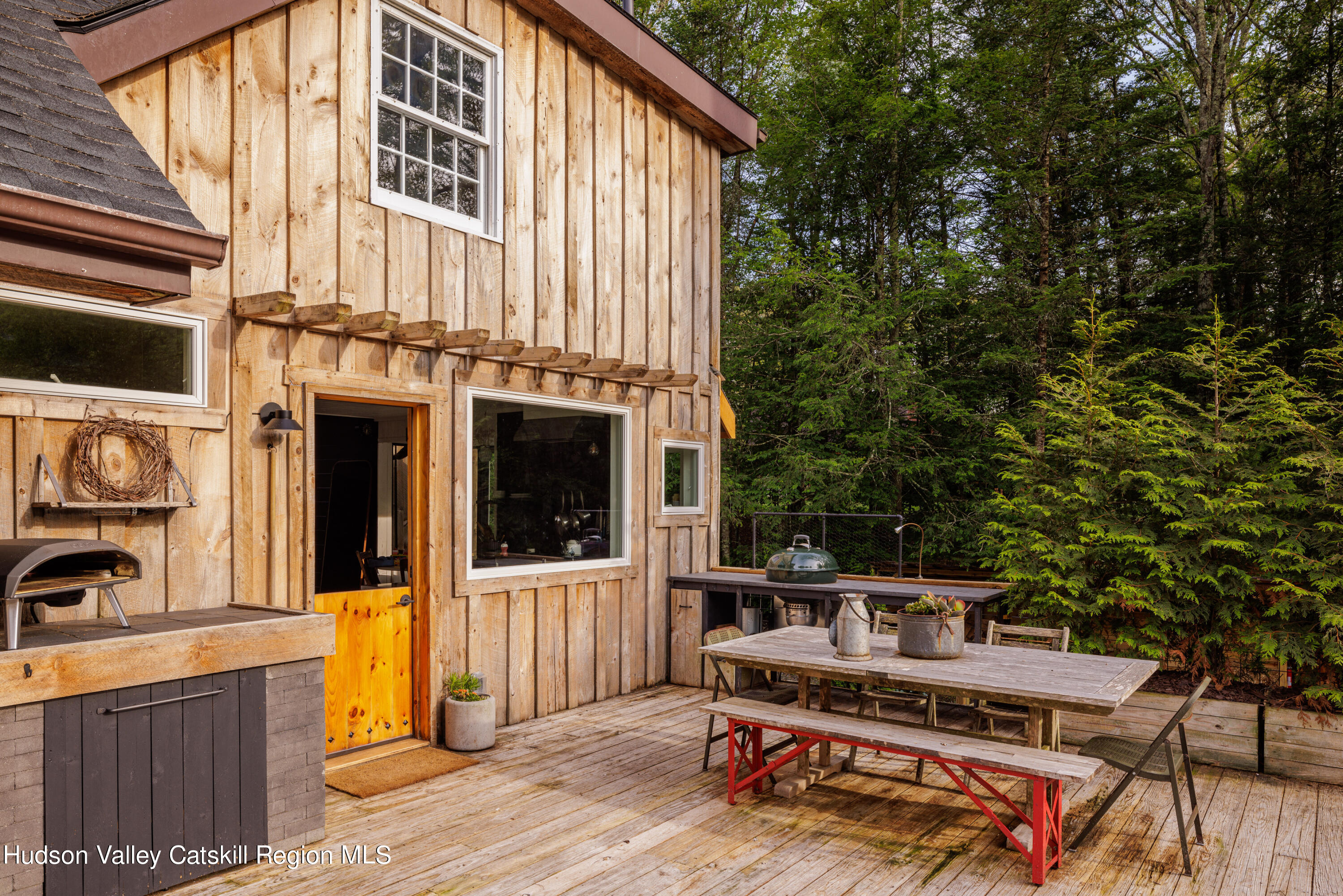 193 Cantine Road Kingston, NY 12401 - Photo 28 of 36 a roof deck with a table and chairs