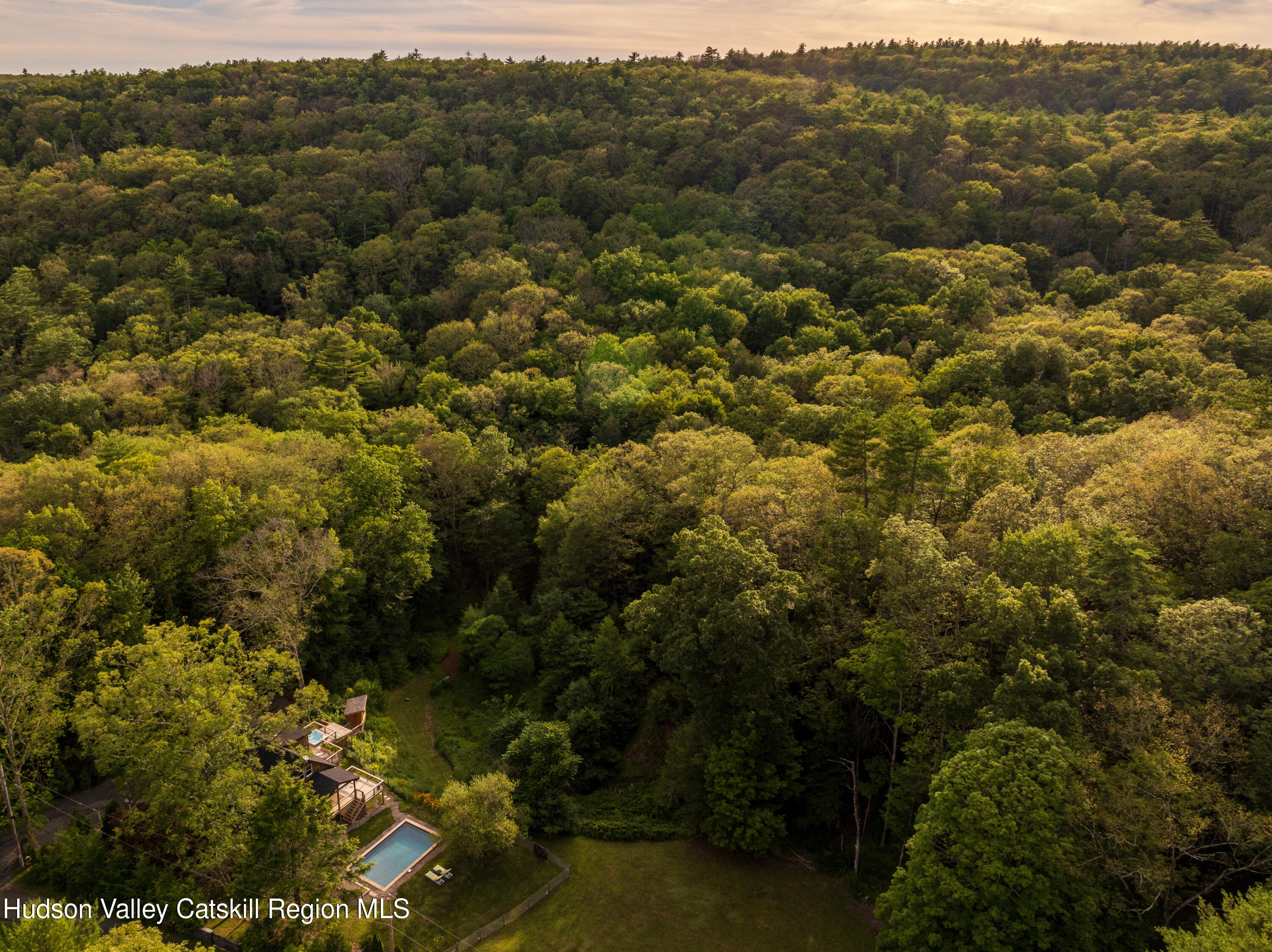 193 Cantine Road Kingston, NY 12401 - Photo 3 of 36 an aerial view of residential house with parking space and mountain view