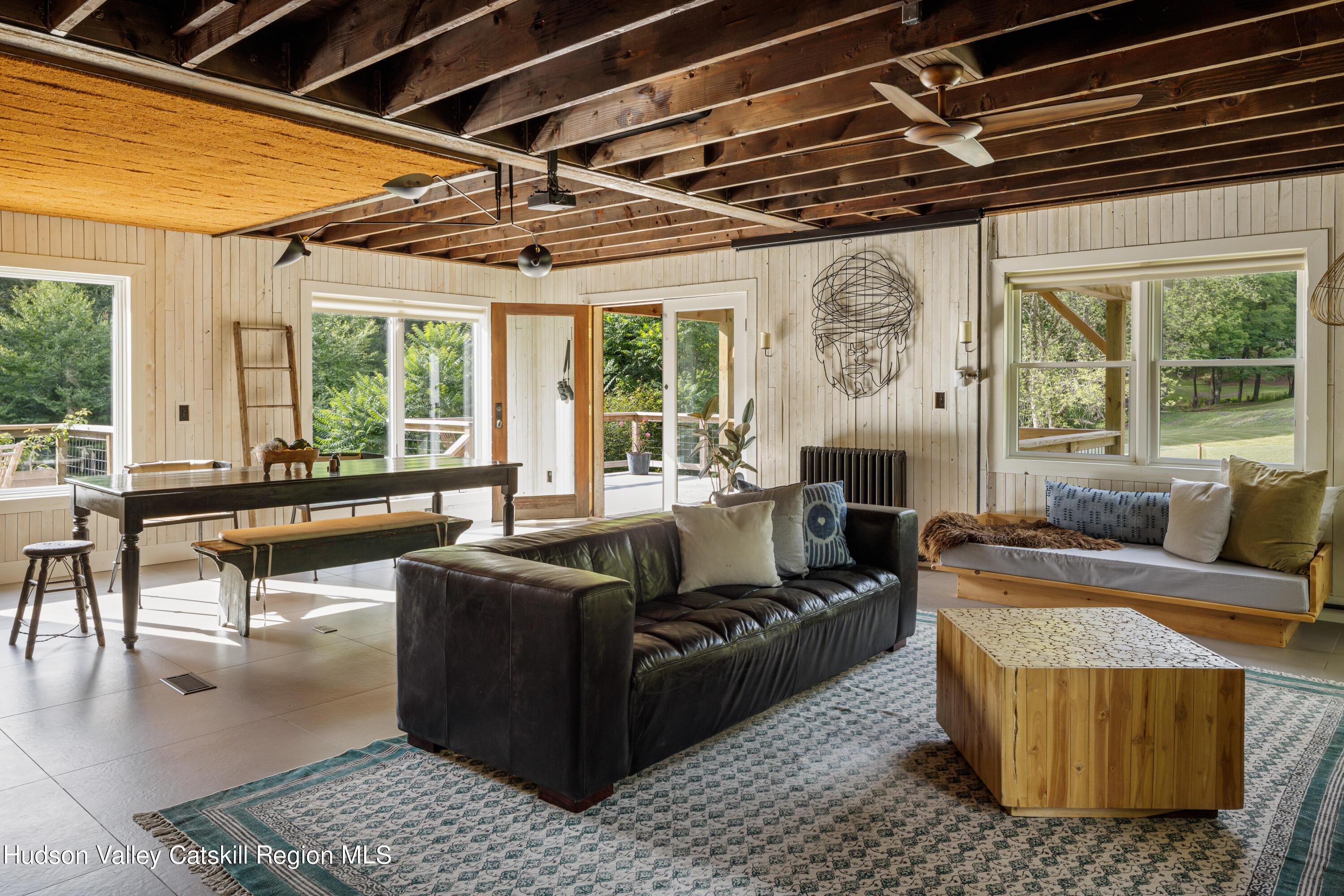 193 Cantine Road Kingston, NY 12401 - Photo 10 of 36 a living room with furniture and a large window