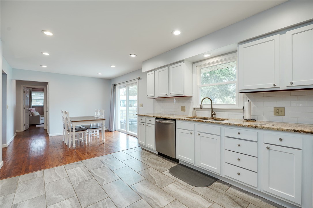 6950 Red Lion 5 Points Road Springboro, OH 45066 - Photo 25 of 78 This bright kitchen offers a welcoming space for culinary creations and casual dining.