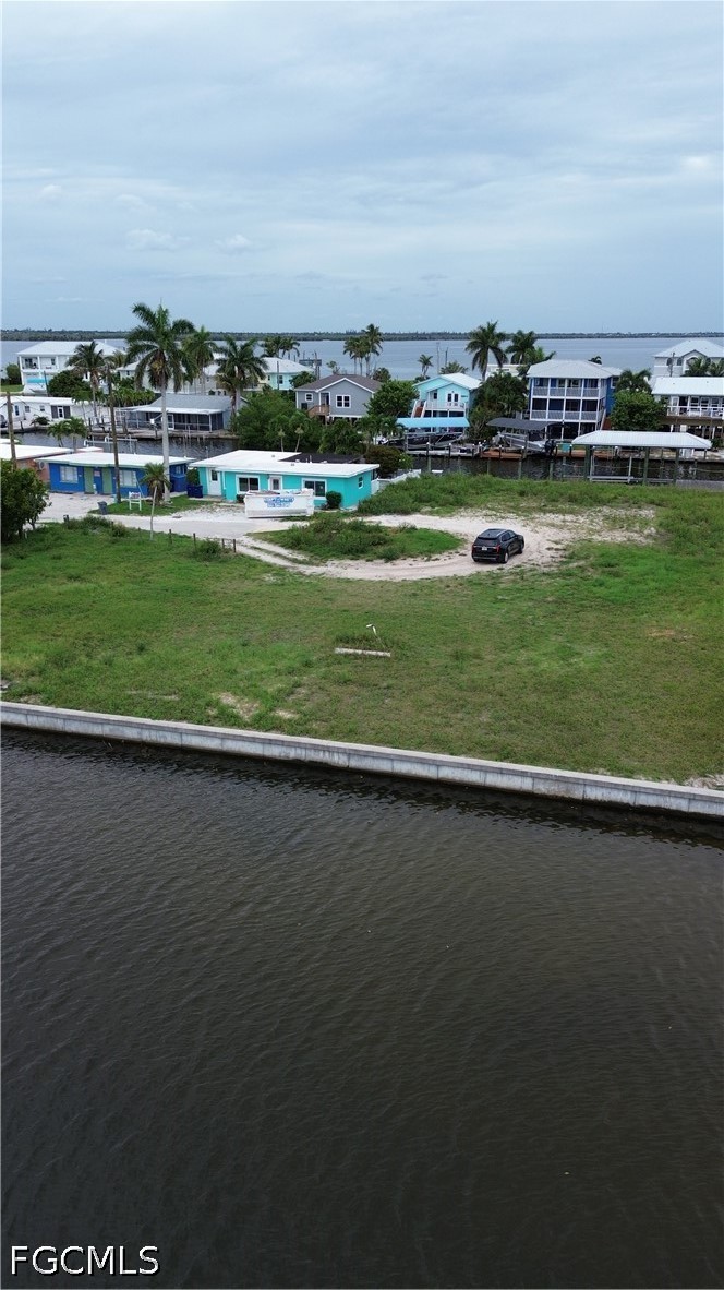 2638 Second Street Matlacha, FL 33993 - Photo 8 of 10 an aerial view of a golf course with a lake view