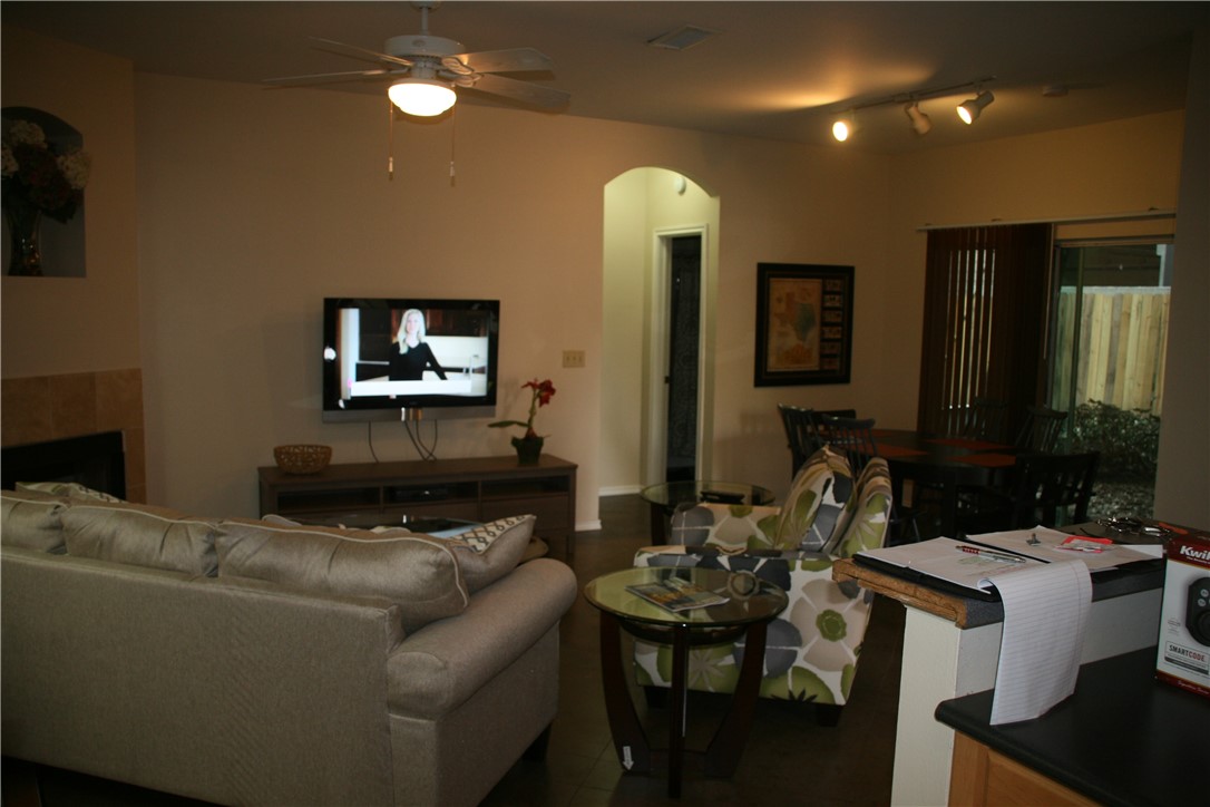2809 Rio Grande Street, Unit B Austin, TX 78705 - Photo 6 of 8 a living room with furniture and a flat screen tv