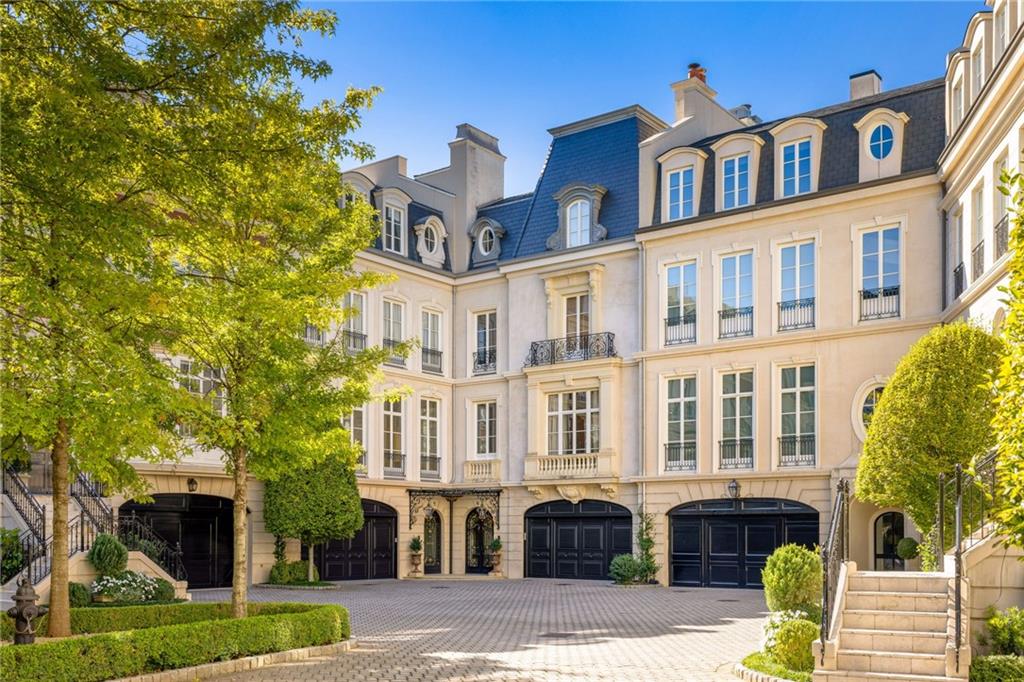 a front view of a building with street view