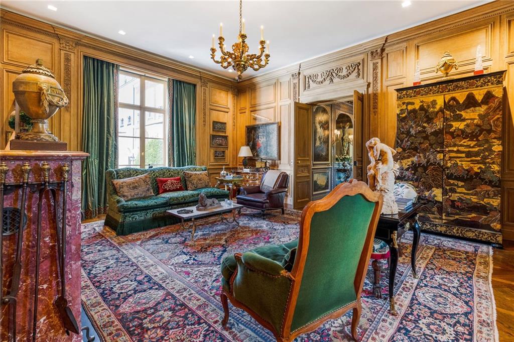 2288 Peachtree Road Northwest, Unit 6 Atlanta, GA 30309 - Photo 36 of 87 a living room with furniture a rug and a window