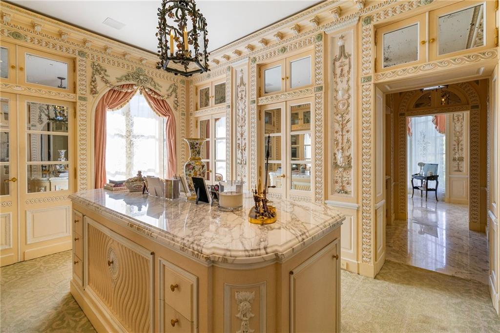 2288 Peachtree Road Northwest, Unit 6 Atlanta, GA 30309 - Photo 42 of 87 a bathroom with a granite countertop sink and a mirror