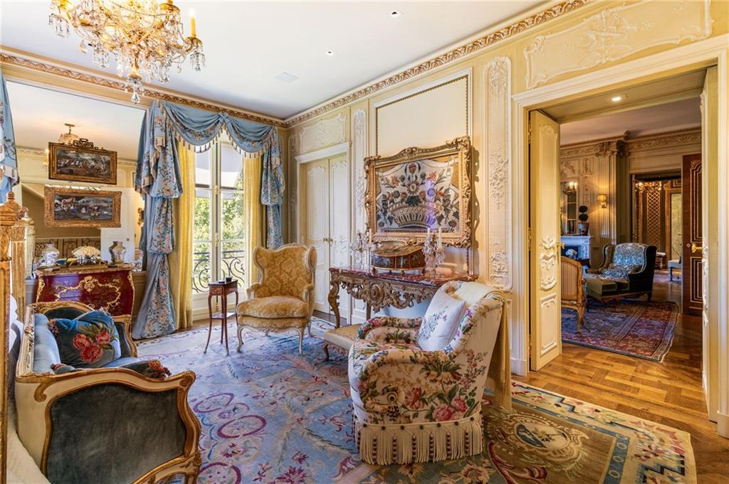 2288 Peachtree Road Northwest, Unit 6 Atlanta, GA 30309 - Photo 51 of 87 a living room with furniture and a floor to ceiling window