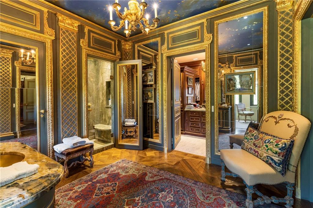 2288 Peachtree Road Northwest, Unit 6 Atlanta, GA 30309 - Photo 60 of 87 a balcony with furniture and a potted plant