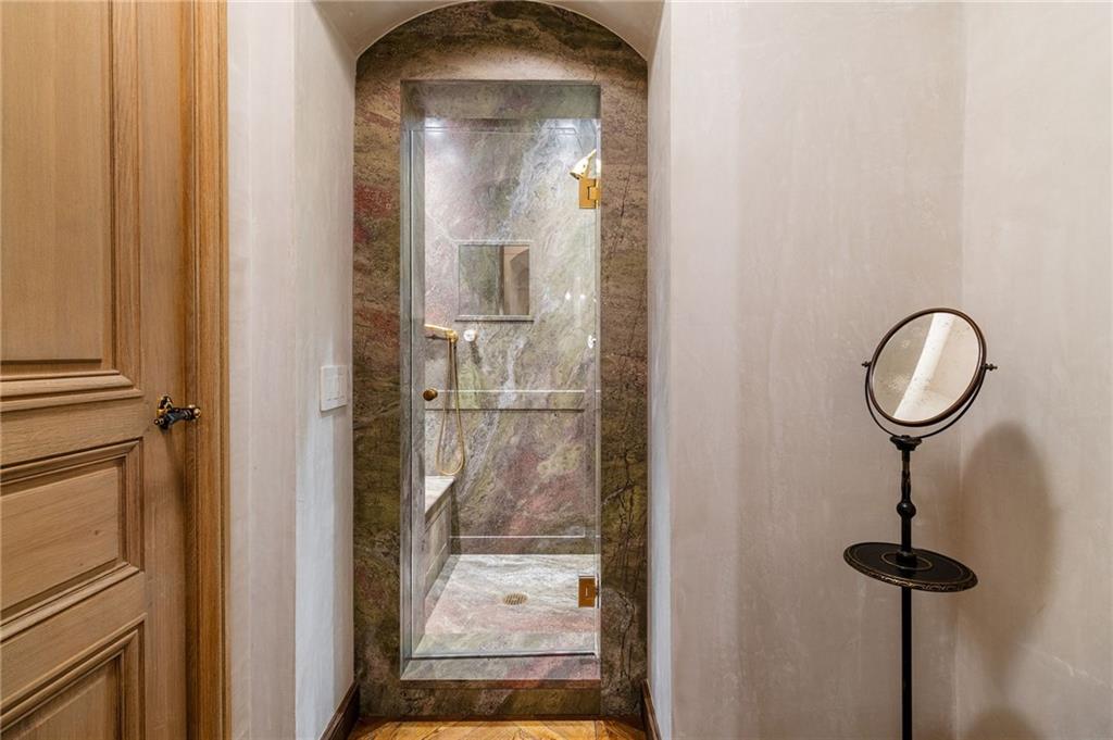 2288 Peachtree Road Northwest, Unit 6 Atlanta, GA 30309 - Photo 69 of 87 a view of a bathroom from a hallway
