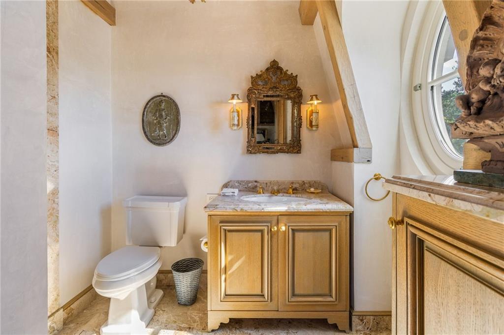 2288 Peachtree Road Northwest, Unit 6 Atlanta, GA 30309 - Photo 73 of 87 a view of a bathroom with a toilet and a sink