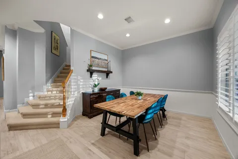 a view of a livingroom with furniture and wooden floor