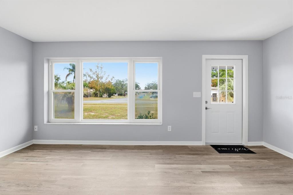 6832 Treehaven Drive Spring Hill, FL 34606 - Photo 3 of 29 a view of an empty room with a window