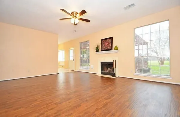 a kitchen with stainless steel appliances granite countertop a stove sink and cabinets