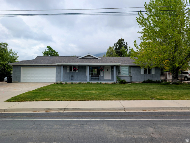 897 East 1200 North Mapleton, UT 84664 - Photo 6 of 54 Single story home featuring a porch, a front yard, and brick siding