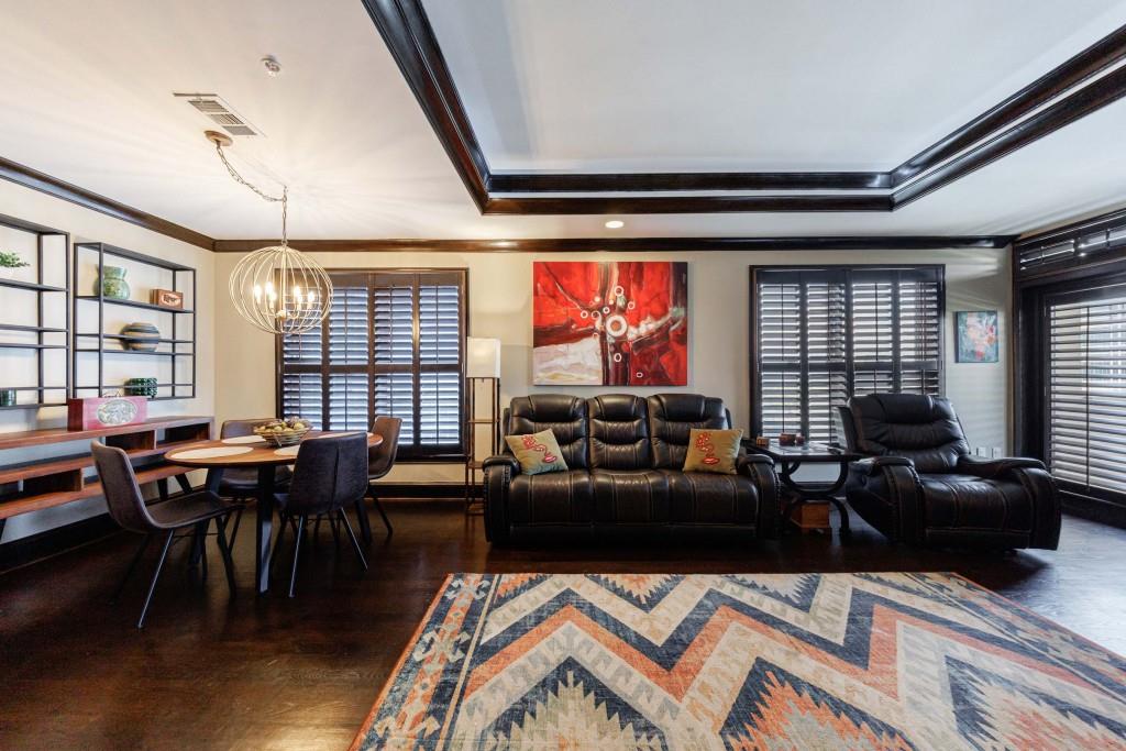 3334 Peachtree Road Northeast, Unit 1506 Atlanta, GA 30326 - Photo 2 of 51 a living room with furniture and a large window
