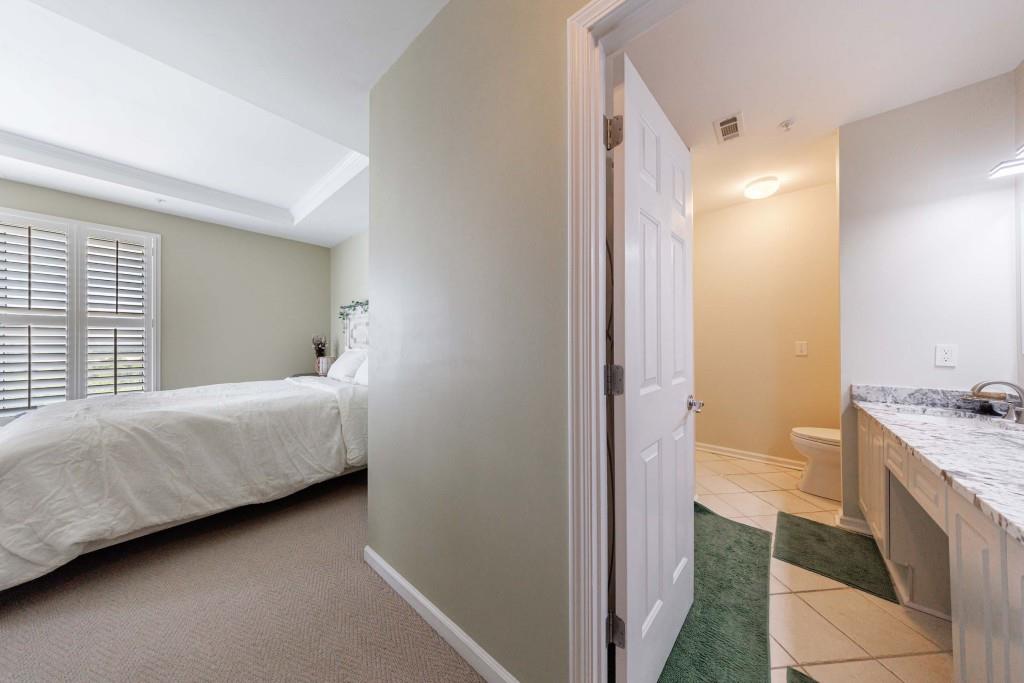 3334 Peachtree Road Northeast, Unit 1506 Atlanta, GA 30326 - Photo 21 of 51 a bathroom with a bathtub and a walk in closet