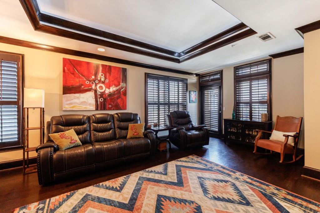 3334 Peachtree Road Northeast, Unit 1506 Atlanta, GA 30326 - Photo 3 of 51 a living room with furniture and a large window