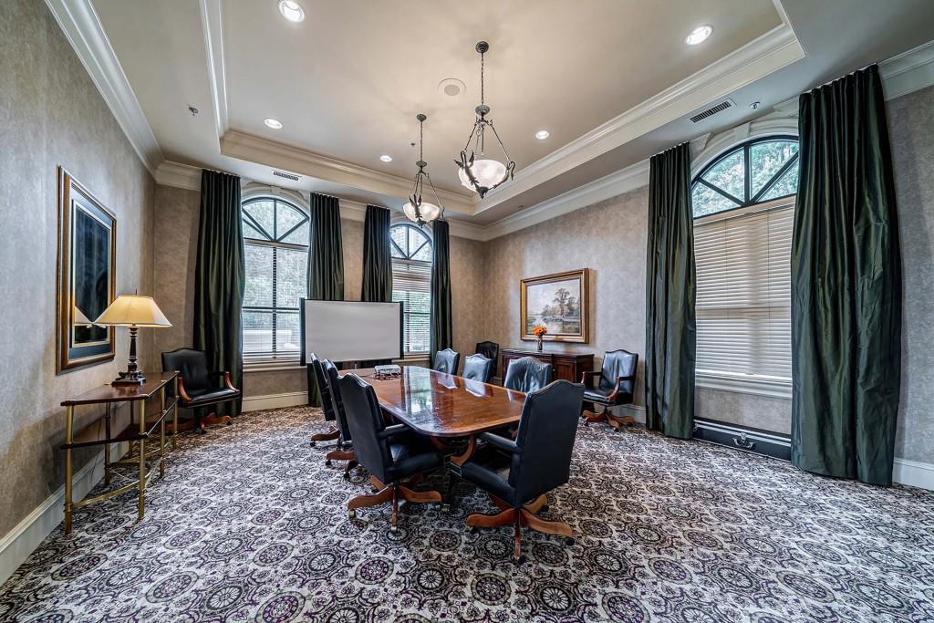3334 Peachtree Road Northeast, Unit 1506 Atlanta, GA 30326 - Photo 43 of 51 a dining room with furniture a chandelier and window
