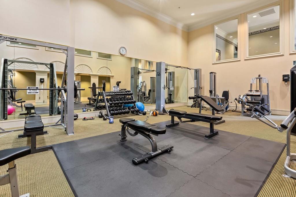 3334 Peachtree Road Northeast, Unit 1506 Atlanta, GA 30326 - Photo 44 of 51 a living room with lots of furniture and white walls