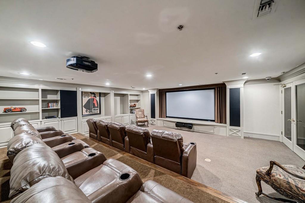 3334 Peachtree Road Northeast, Unit 1506 Atlanta, GA 30326 - Photo 47 of 51 a living room with furniture and a flat screen tv