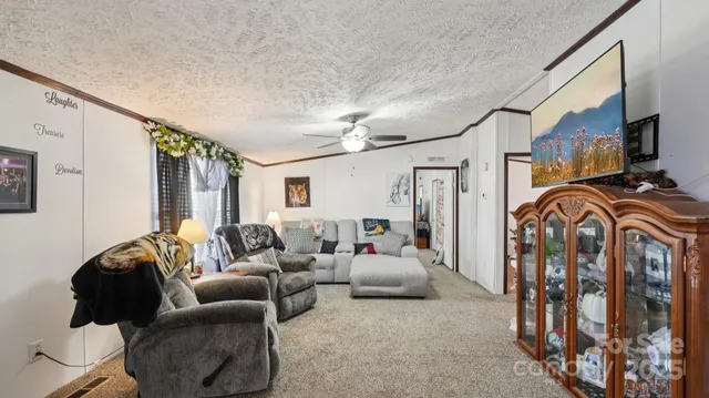 a bedroom with furniture and a chandelier