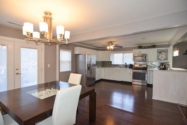 720 Durham Lane Hoffman Estates, IL 60169 - Photo 12 of 34 a view of kitchen with refrigerator dining table and chairs
