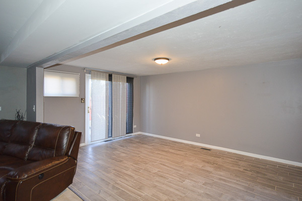 720 Durham Lane Hoffman Estates, IL 60169 - Photo 26 of 34 a view of livingroom with furniture and wooden floor