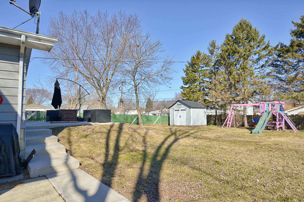 720 Durham Lane Hoffman Estates, IL 60169 - Photo 28 of 34 a view of large house with a yard