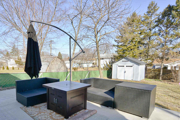 720 Durham Lane Hoffman Estates, IL 60169 - Photo 29 of 34 a front view of a house with garden and trees