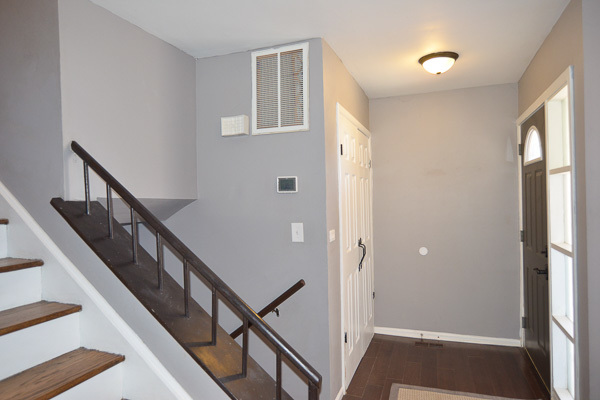 720 Durham Lane Hoffman Estates, IL 60169 - Photo 33 of 34 a view of an entryway with wooden floor and stairs