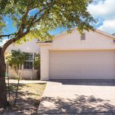 a view of a backyard of the house
