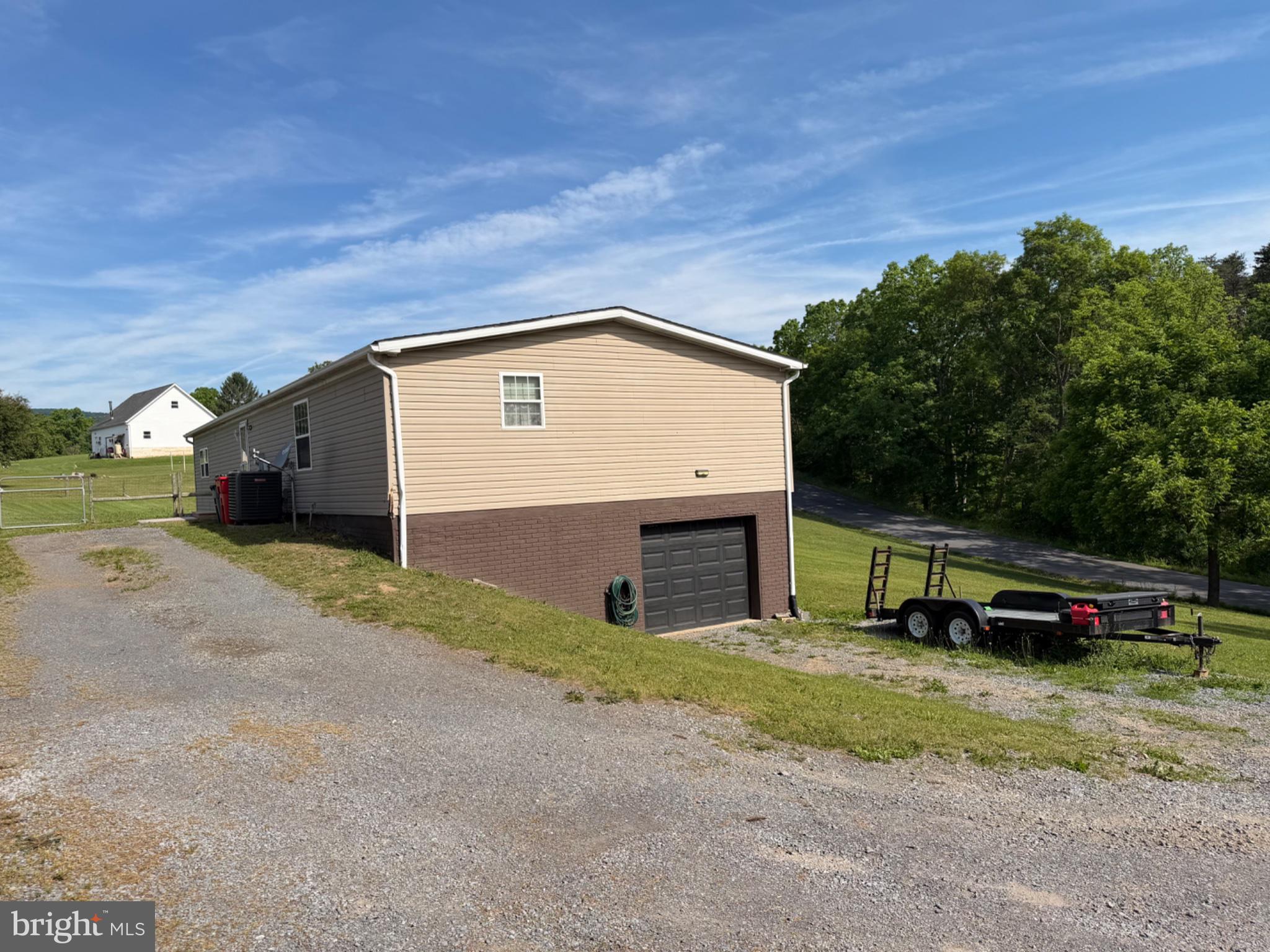 1898 Sawmill Road Hedgesville, WV 25427 - Photo 6 of 6 Charming home with scenic backdrop.
