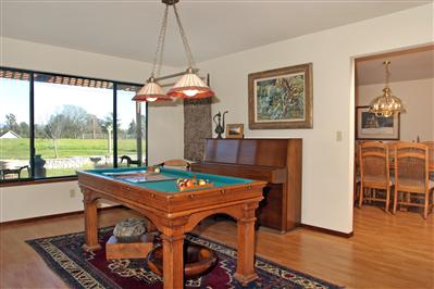 4101 Hessel Road Sebastopol, CA 95472 - Photo 4 of 4 a view of a dining room with furniture window and wooden floor