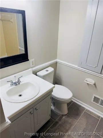 a bathroom with a sink and a toilet