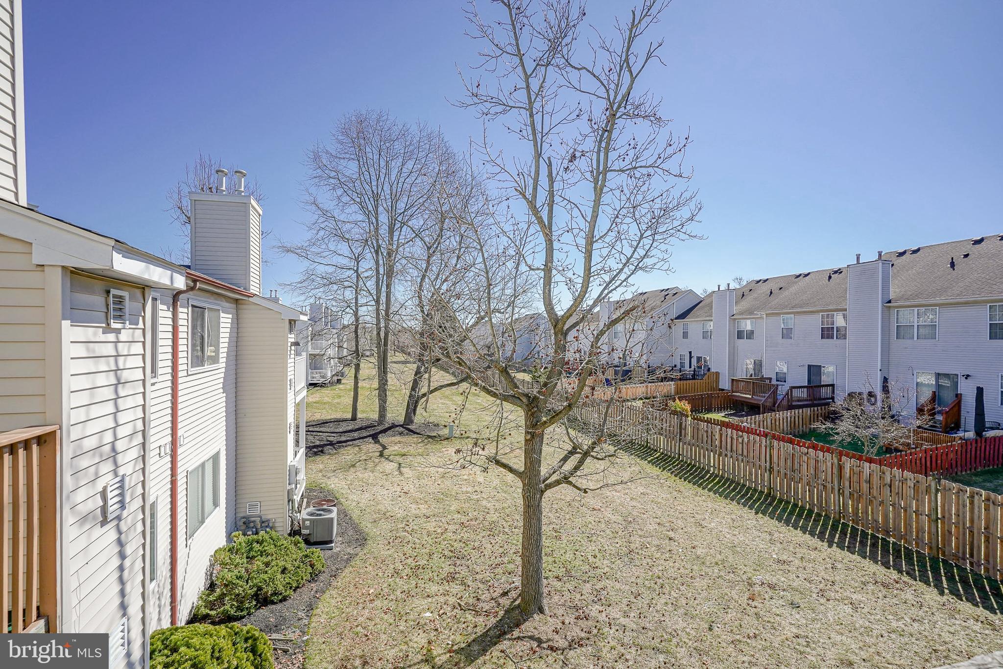 605 Woodchip Road Lumberton, NJ 08048 - Photo 18 of 18 a view of a house with a yard covered in snow