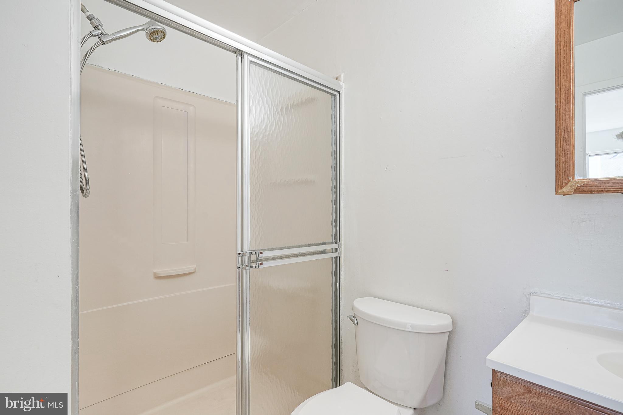 605 Woodchip Road Lumberton, NJ 08048 - Photo 8 of 18 a white toilet sitting next to a shower