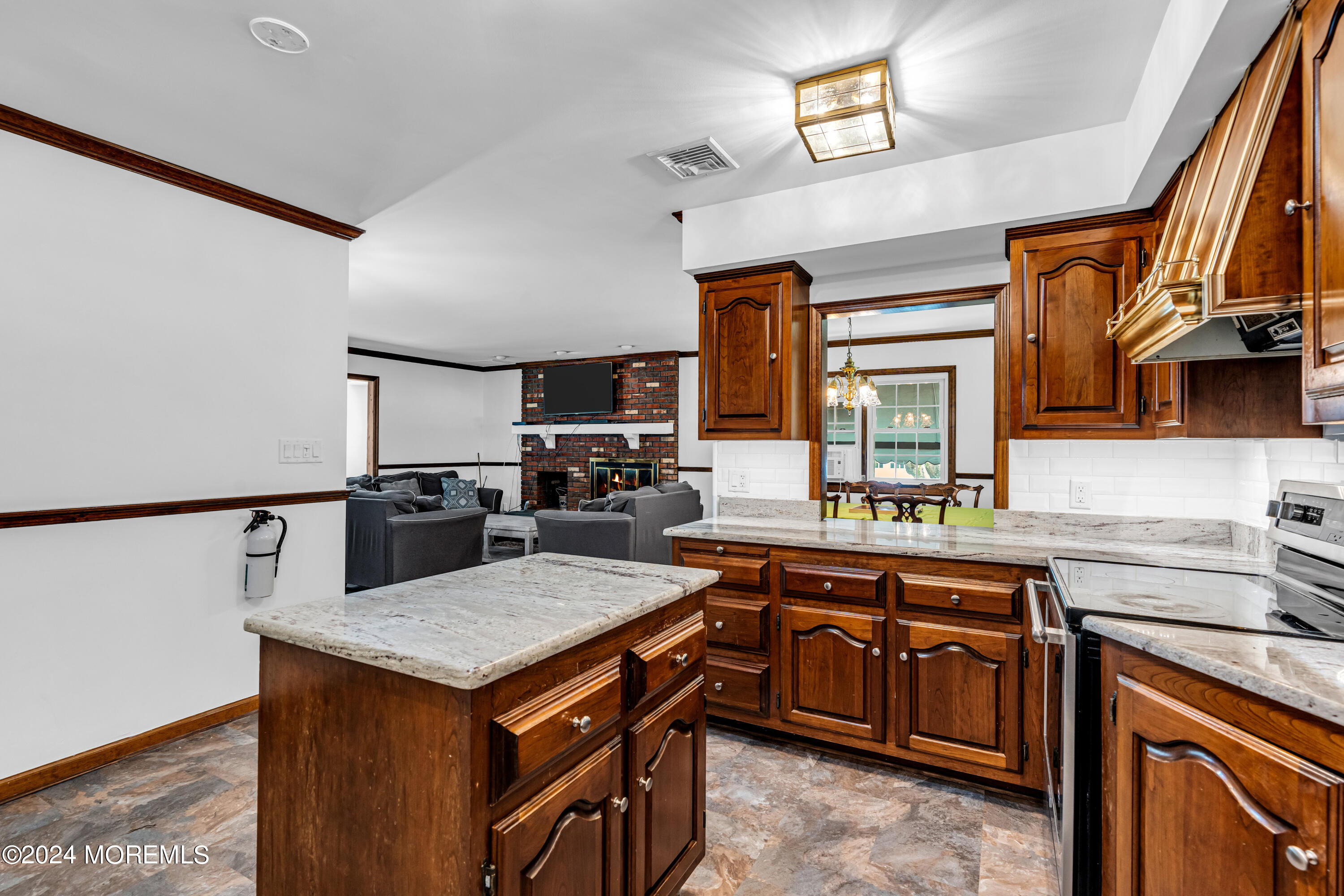 139 Broadway Road Freehold, NJ 07728 - Photo 15 of 37 a kitchen with a stove a sink dishwasher and a refrigerator