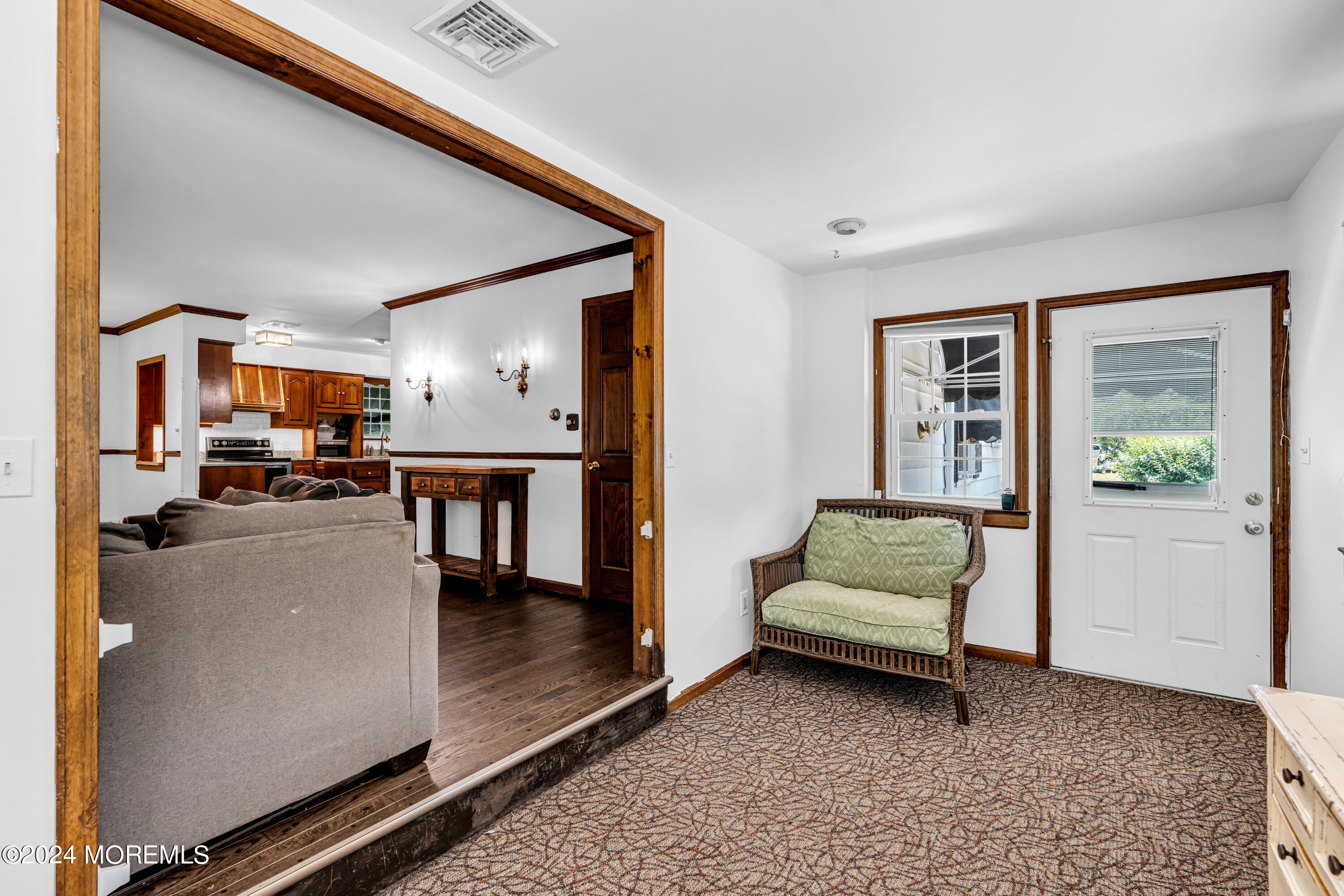 139 Broadway Road Freehold, NJ 07728 - Photo 21 of 37 a living room with furniture and a flat screen tv