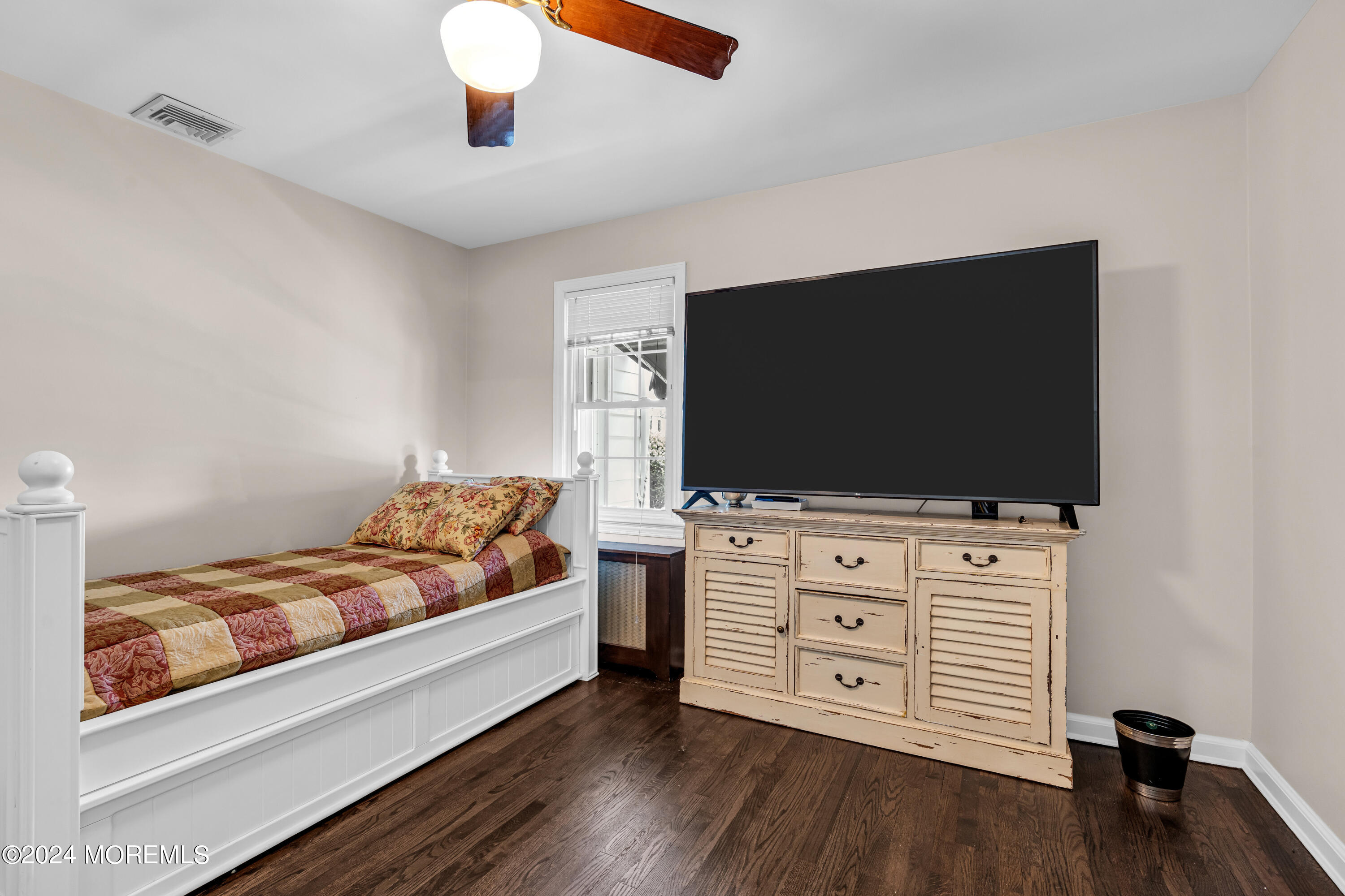 139 Broadway Road Freehold, NJ 07728 - Photo 32 of 37 a living room with furniture and a flat screen tv