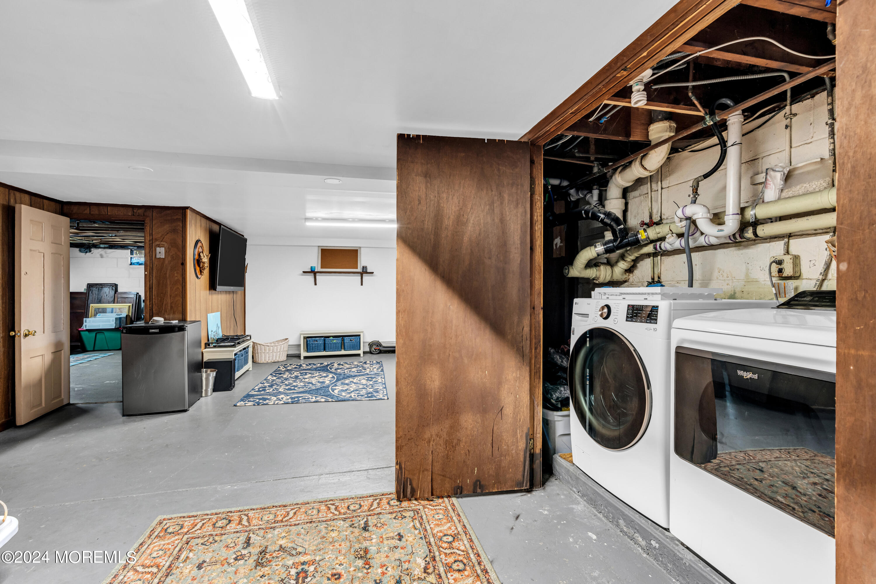 139 Broadway Road Freehold, NJ 07728 - Photo 34 of 37 a utility room with sink dryer and washer