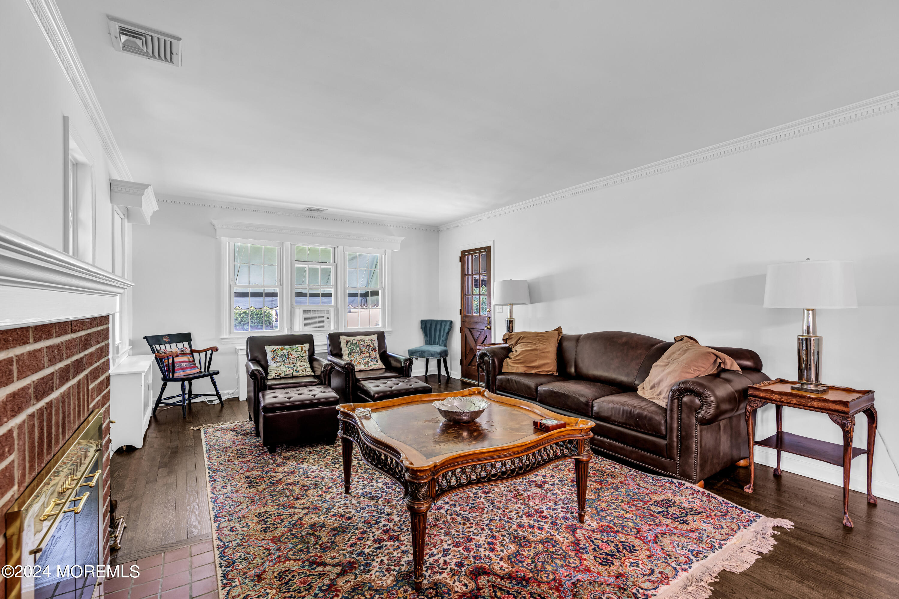 139 Broadway Road Freehold, NJ 07728 - Photo 5 of 37 a living room with furniture and a rug
