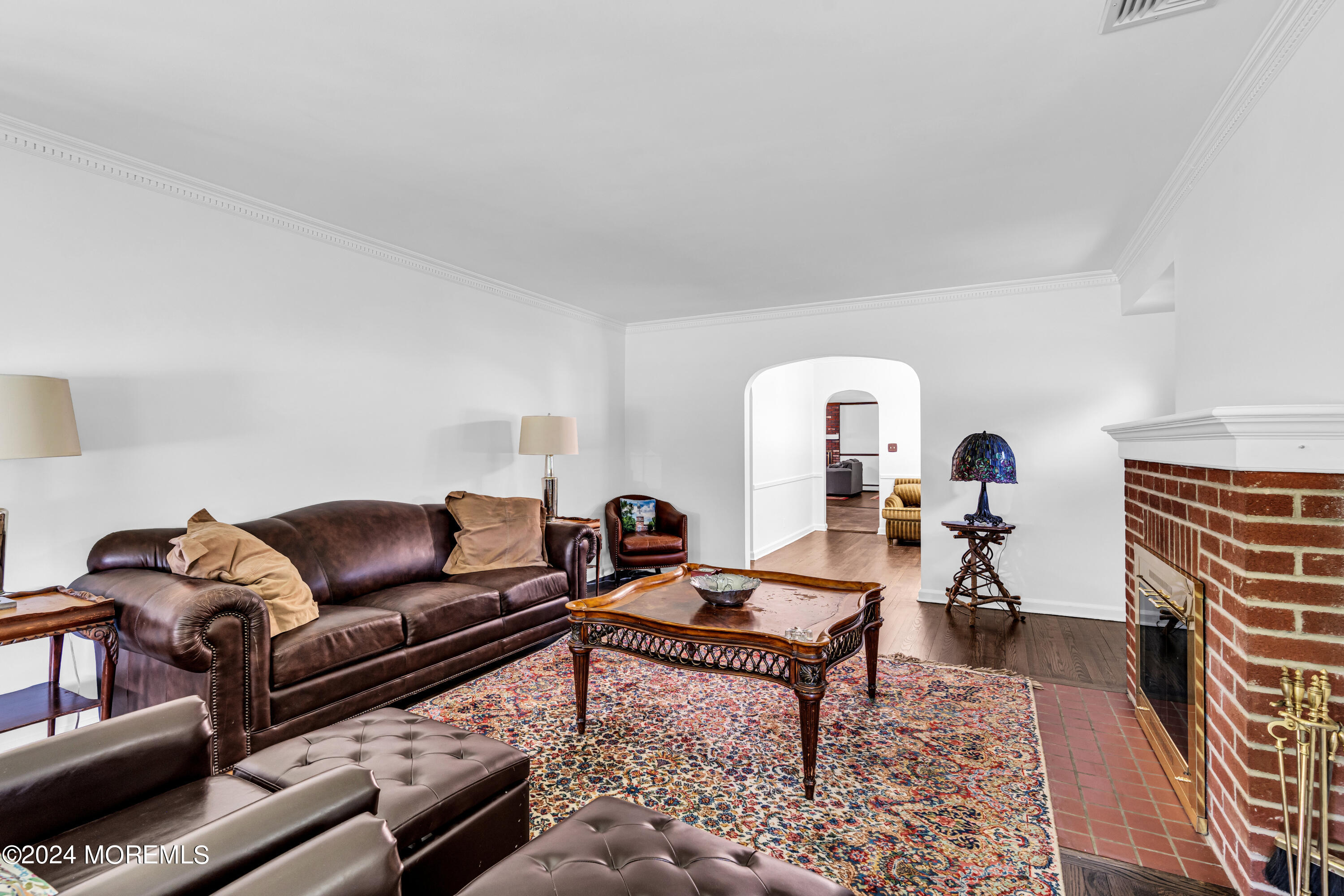 139 Broadway Road Freehold, NJ 07728 - Photo 8 of 37 a living room with furniture a rug and a window