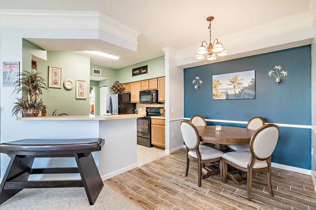 a view of a dining room with furniture