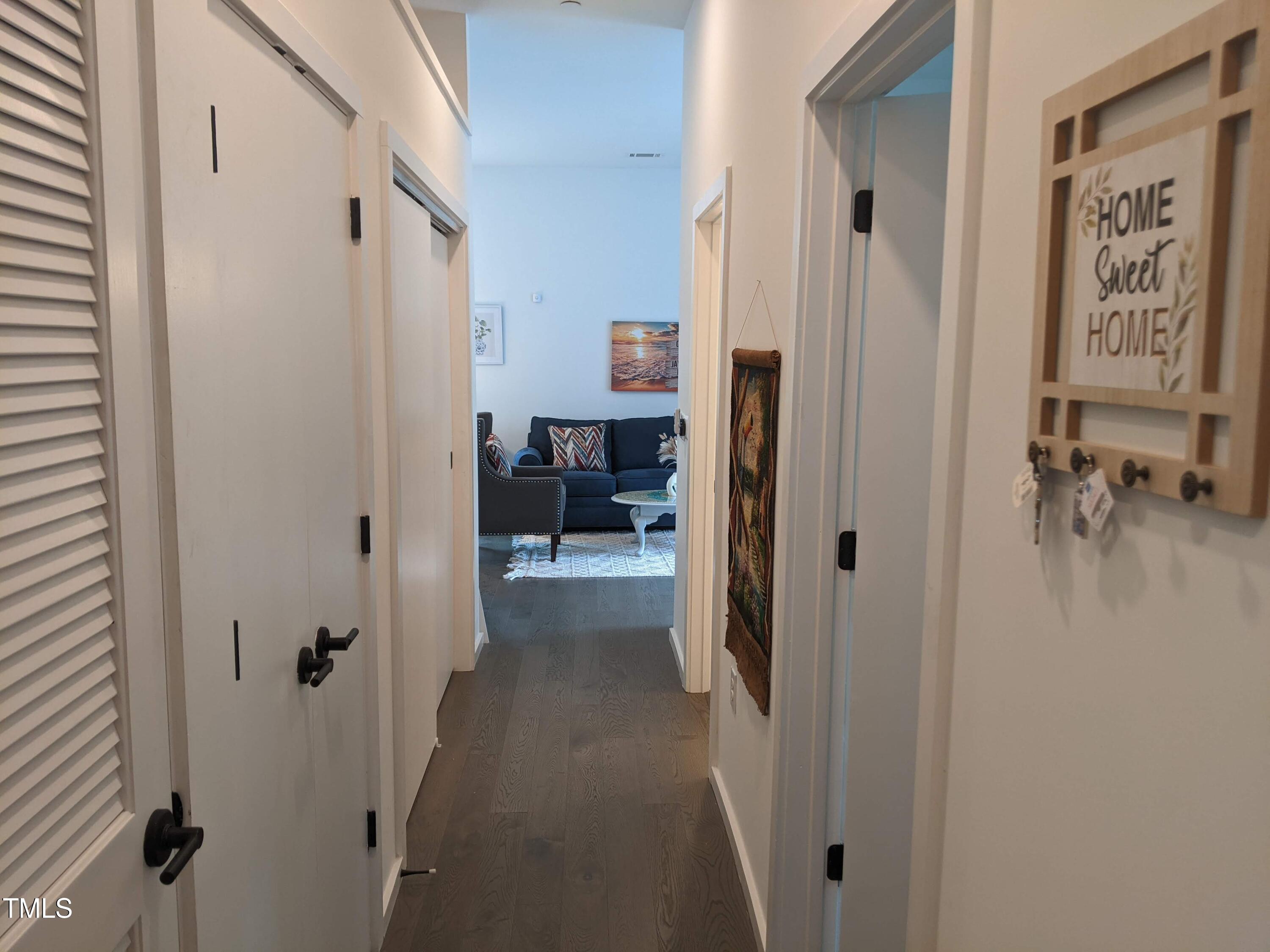 600 South Duke Street, Unit 11 Durham, NC 27701 - Photo 11 of 16 a view of a hallway with elevator and glass door