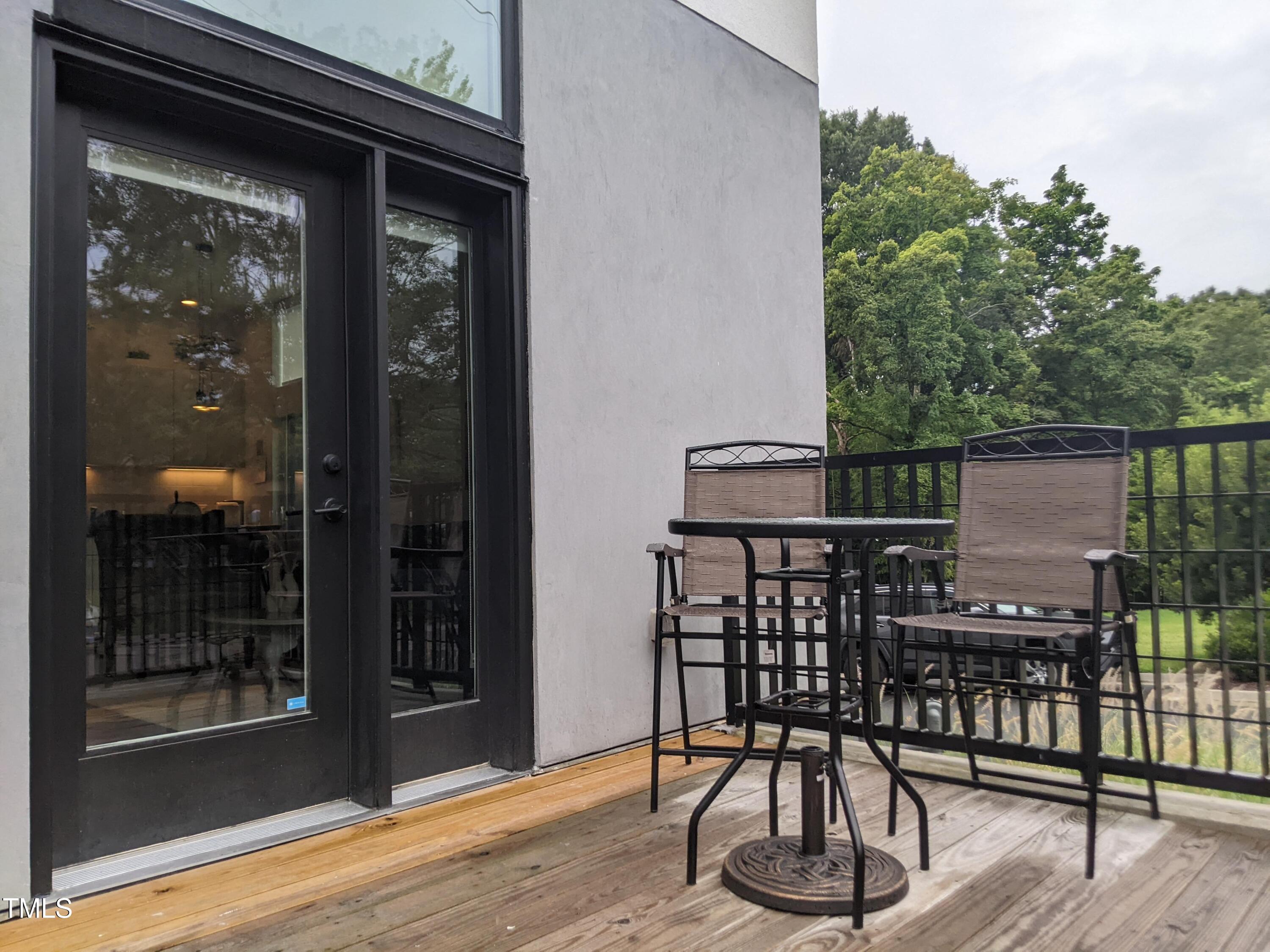600 South Duke Street, Unit 11 Durham, NC 27701 - Photo 15 of 16 a view of a balcony with chairs