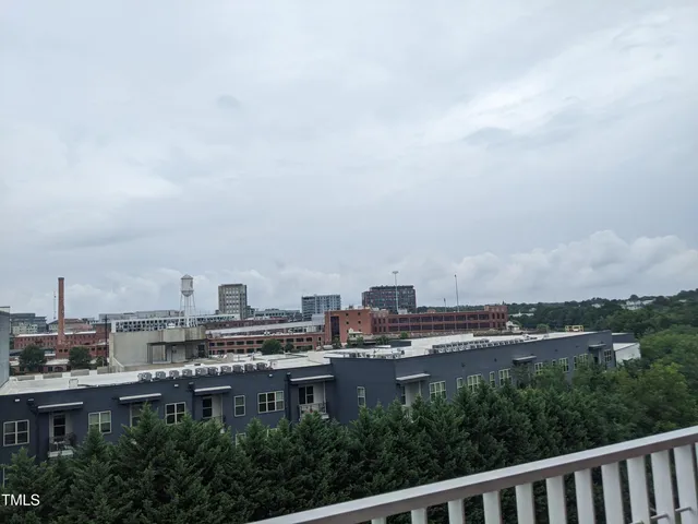 a view of a city with tall buildings